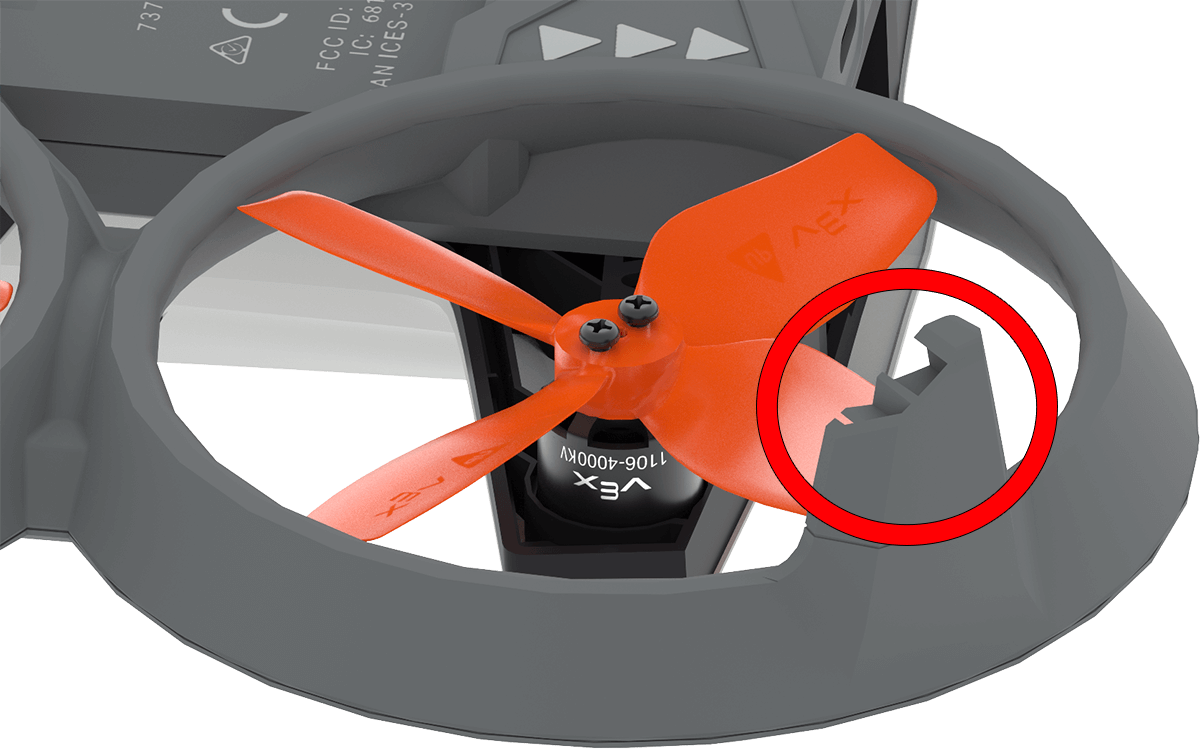 Close-up of the propellers with a red circle highlighting a cracked or broken section of the propeller guard.