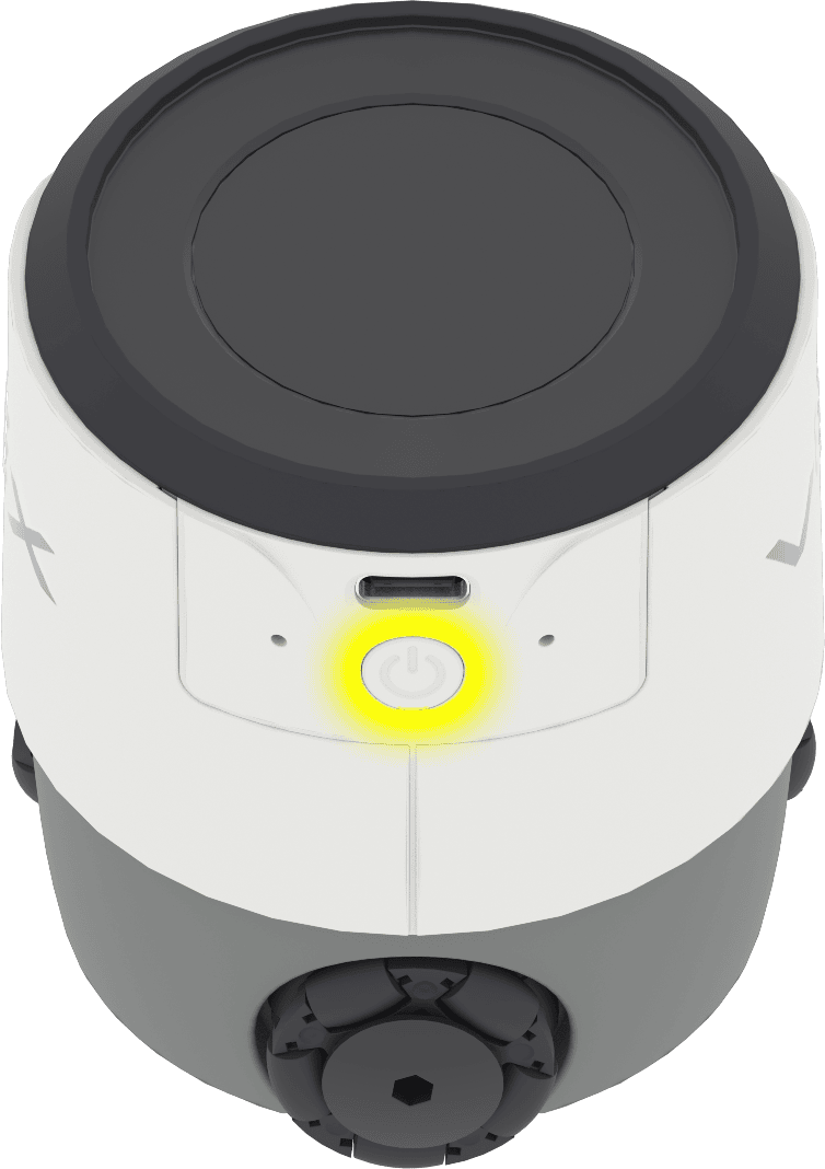 La parte posterior del robot AIM con el botón de encendido resaltado en amarillo. El botón se encuentra en la parte posterior del robot, debajo del puerto para el cable USB-C.
