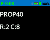 La pantalla del Cerebro mostraba números y letras impresos con una fuente de tamaño PROP 40. En la parte inferior de la pantalla, se leía R:2 C:8.