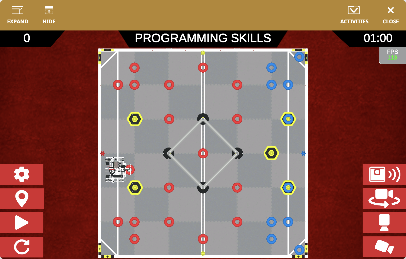 The VEXcode VR Playground window showing the V5 24-25 High Stakes Playground. It shows the Axel Robot scoring Rings and Mobile Goals in the V5 24-25 Virtual Skills field.